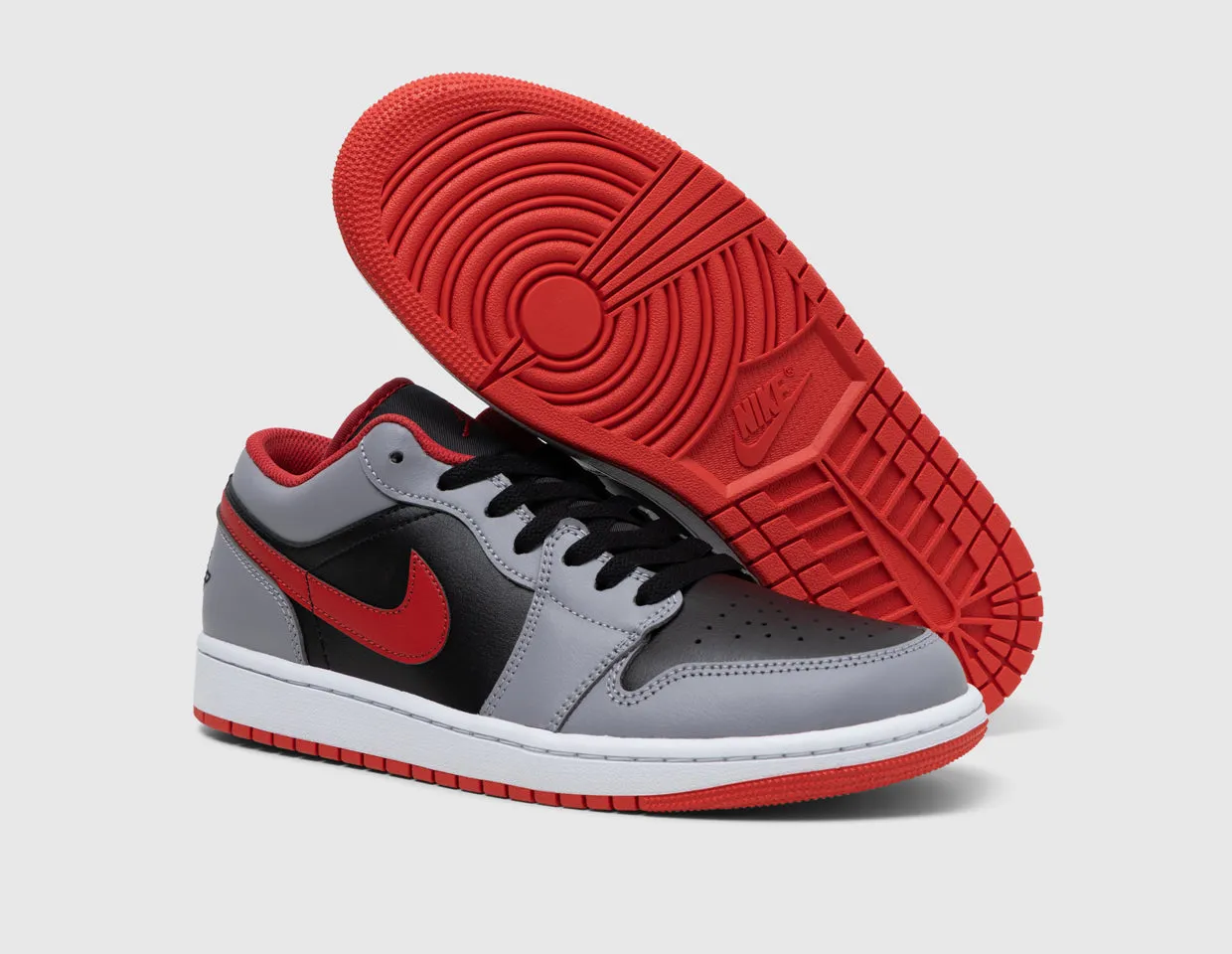 Jordan 1 Low Black / Fire Red - Cement Grey