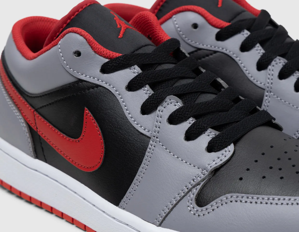 Jordan 1 Low Black / Fire Red - Cement Grey