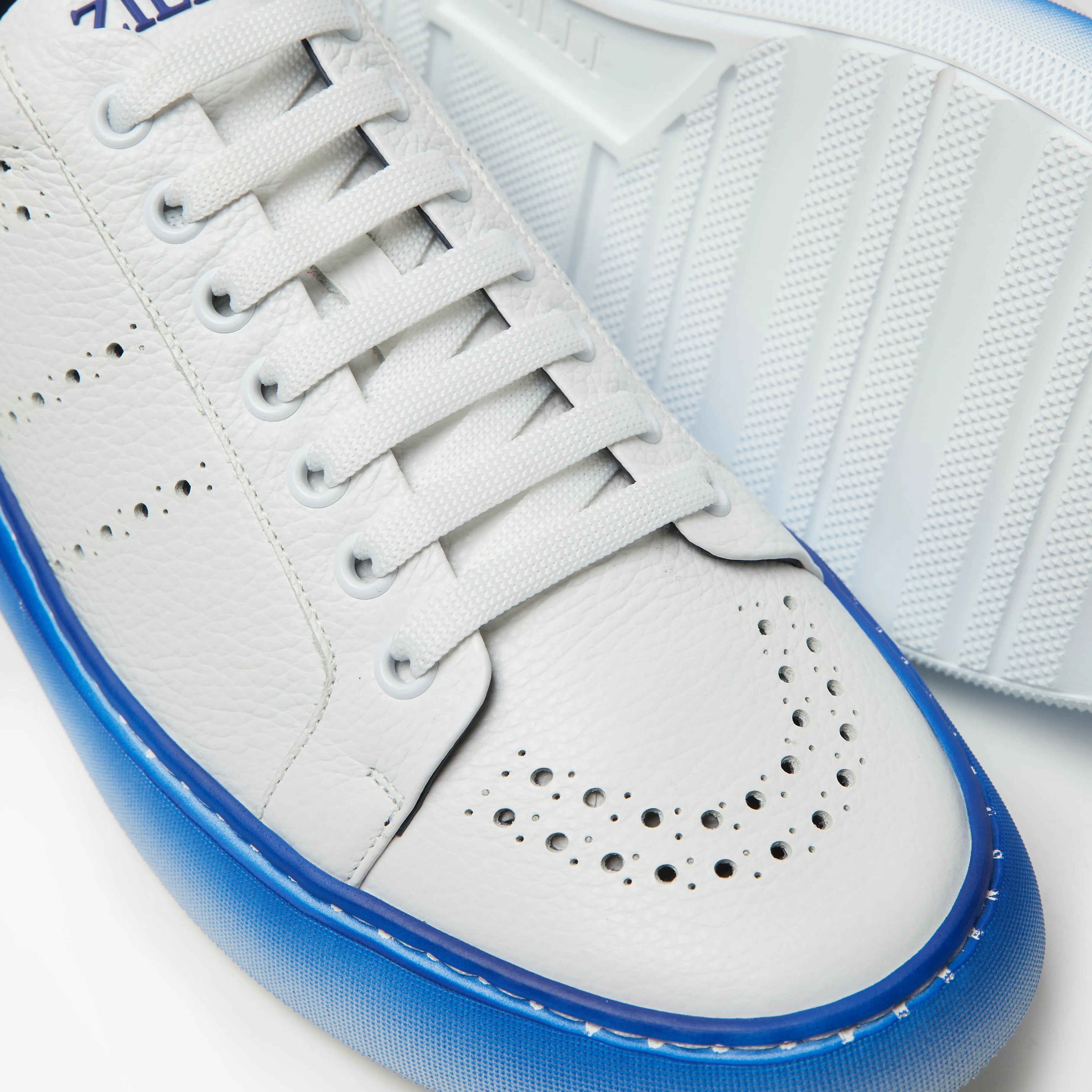 Zilli Italian White Perforated Leather Sneaker with Palladium-Finish Rivet